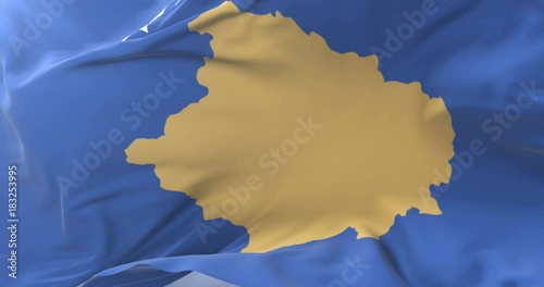 Flag of Kosovo waving at wind with blue sky in slow, loop photo