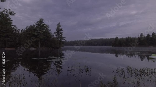 Flying low over bushes then over lake McKellar early in the morning mist
UNGRADED DLOG FOOTAGE photo