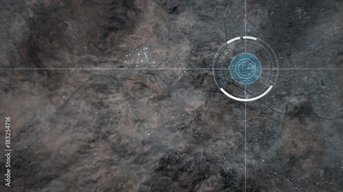 Surveillance drone camera scanning a city in the middle east desert, POV of drone or satellite with HUD and heat camera monitoring Sanaa in Yemen
