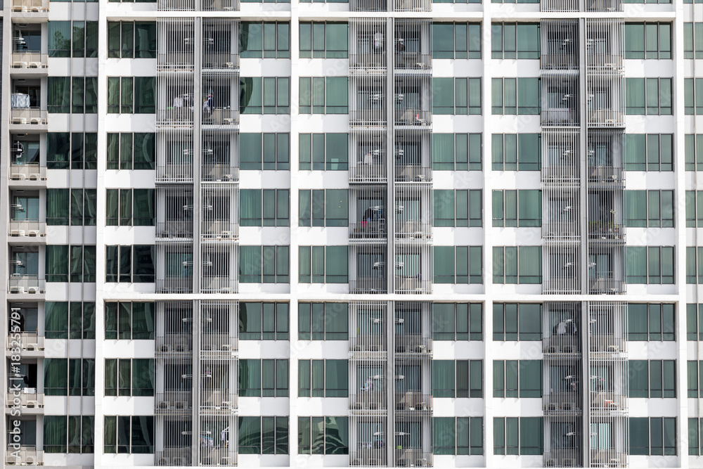 Apartment windows showing a new high rise condo with good real estate rentals and spaces to buy Apartment windows showing a new high rise condo with good real estate rentals and spaces to buy