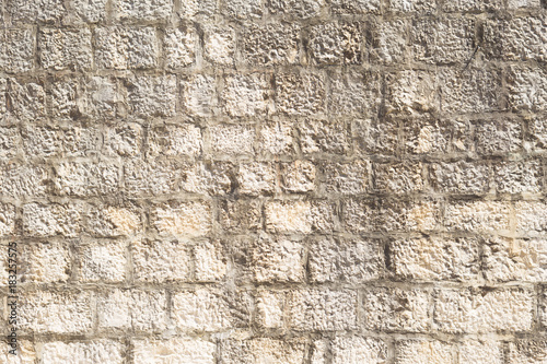 Old ancient wall brick vintage texture; outdoor background