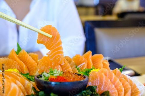 Salmon sashimi set on white bowl (Selective focus)