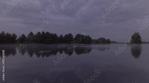 flying low over water and early morning mist on lake McKellar
UNGRADED DLOG FOOTAGE photo