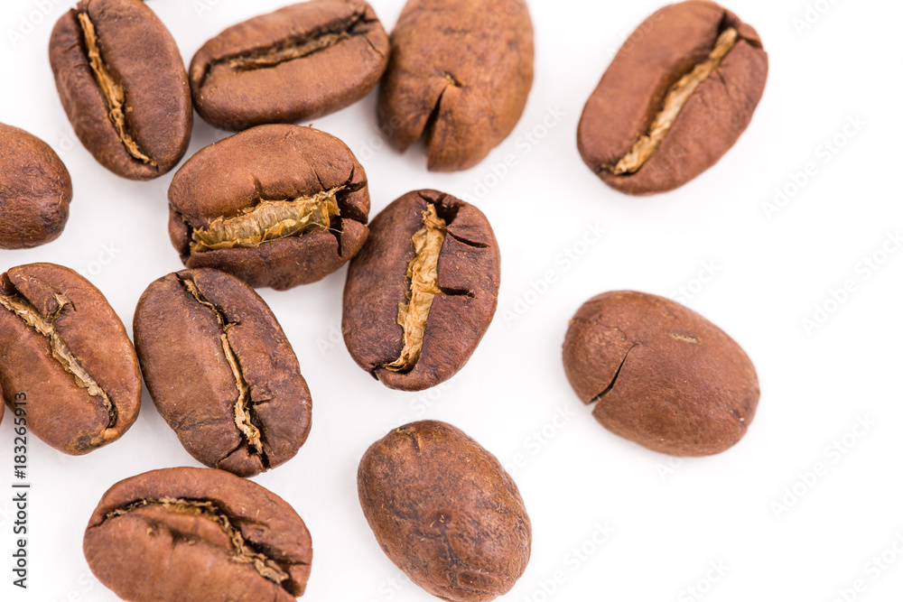 Roasted coffee beans on wood texture background. Roasted coffee beans on wood texture background.