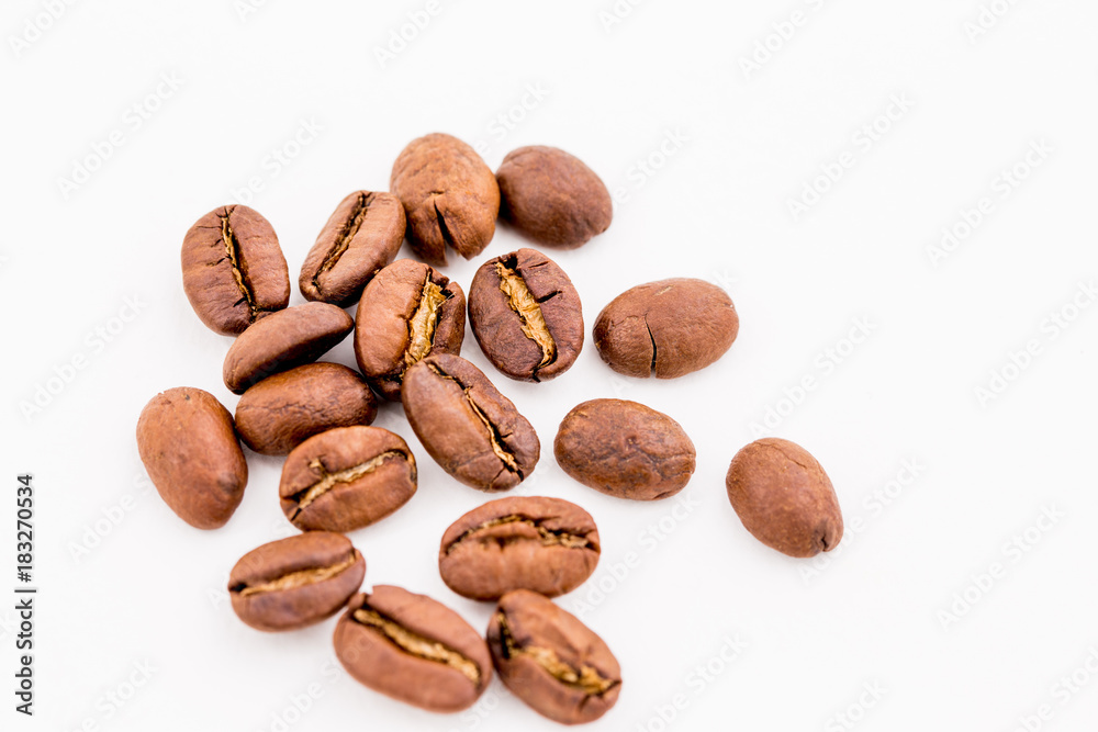 Roasted coffee beans on wood texture background. Roasted coffee beans on wood texture background.