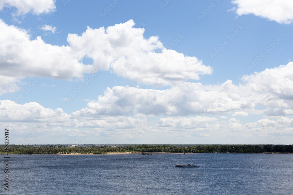 Blue sky, clouds, river and horizon Blue sky, clouds, river and horizon