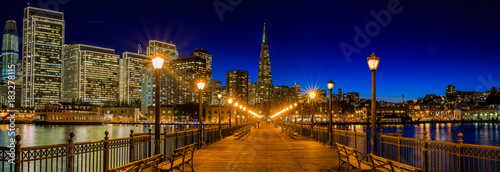 Downtown San Francisco and the Transamerica Pyramid at Chrismas from wooden Pier 7 at sunset
