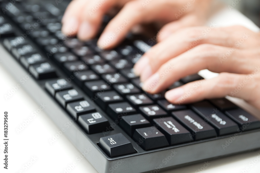 Hands using keyboard on white background Hands using keyboard on white background