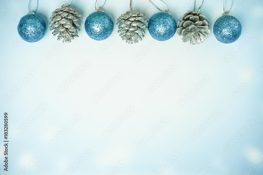 Cyan christmas ball and pine cone - Winter background