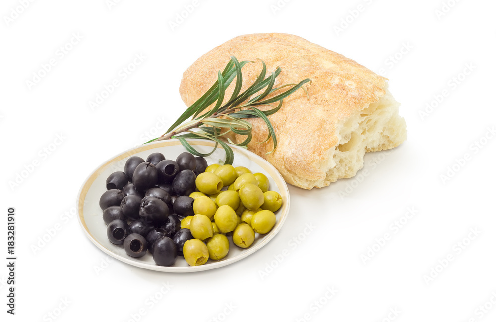 Black and green olives, olive branch and ciabatta