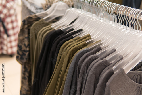 Men clothes, row of t-shirt collection, shopping
