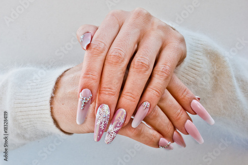 nails with pink Christmas decorations