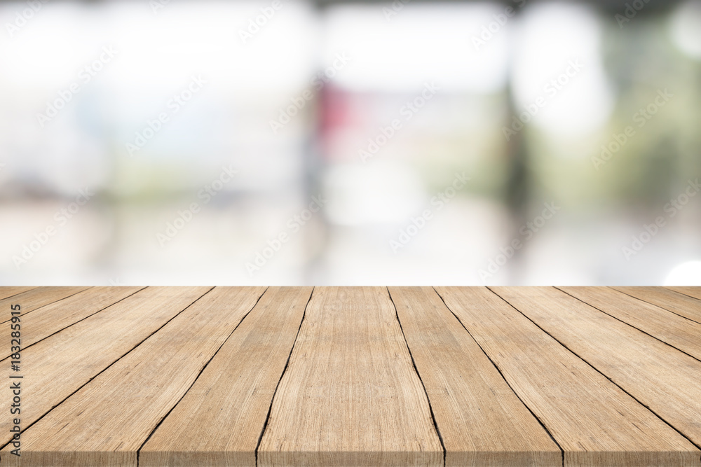Empty wood table top on blurred background,space for montage product Empty wood table top on blurred background,space for montage product
