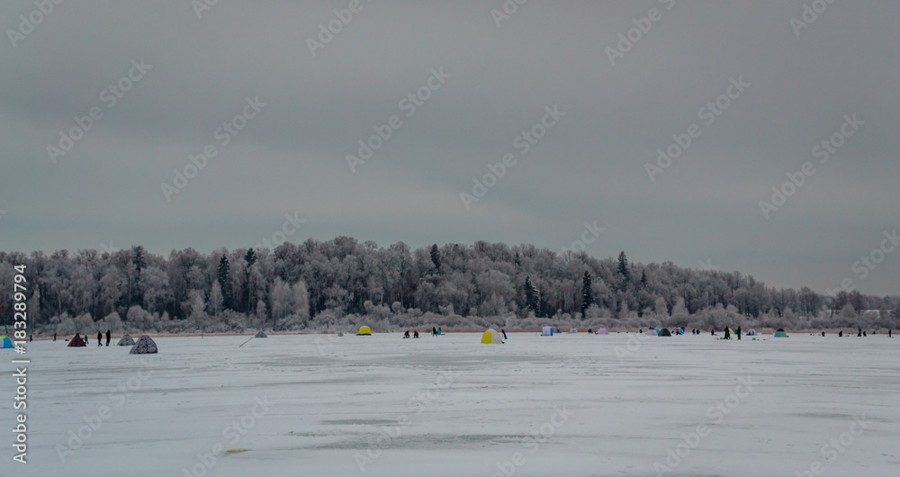Winter fishing on a frozen lake