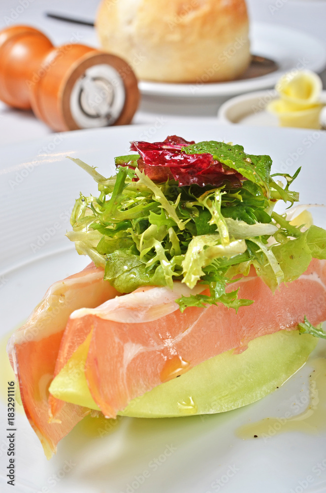 Close up of fresh melon with ham salad Close up of fresh melon with ham salad