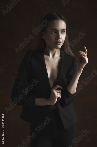 portrait young elegant woman in black jacket © Aleksandr Doodko