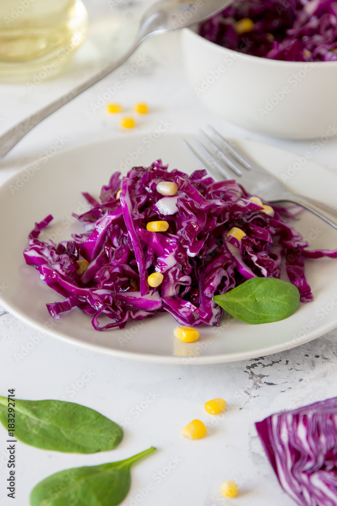 Red cabbage with corn and oil. Vegeterian salad Red cabbage with corn and oil. Vegeterian salad