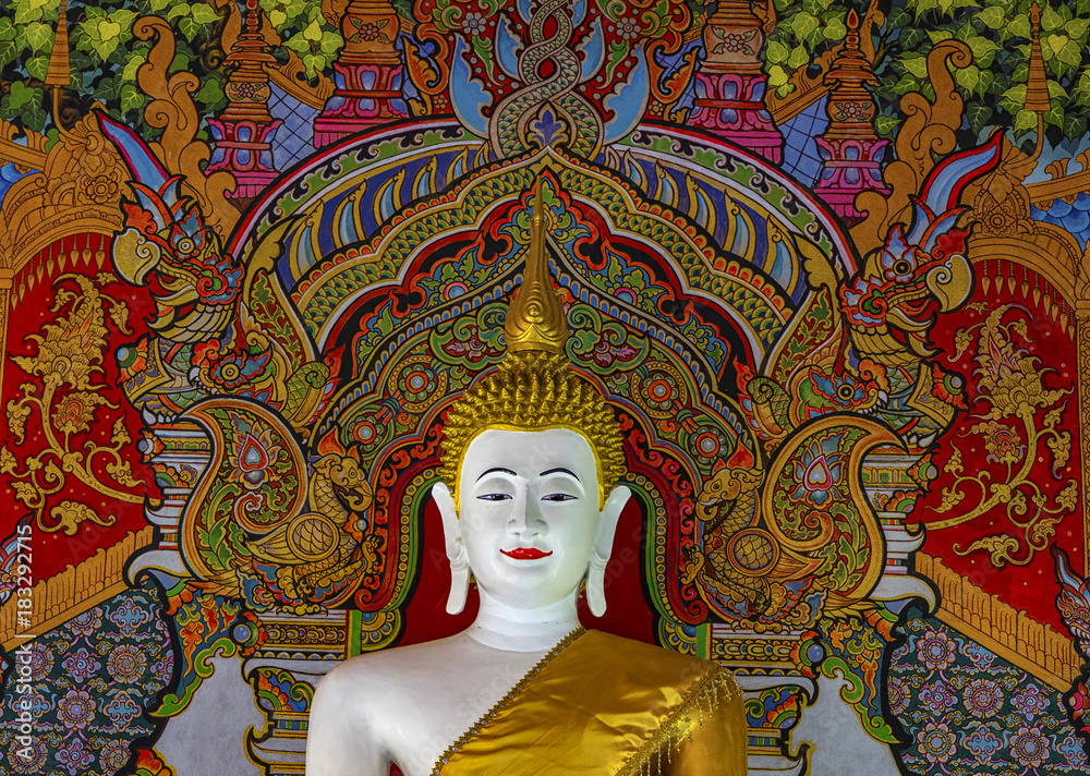 Buddha statue with painted background  Prao Thailand