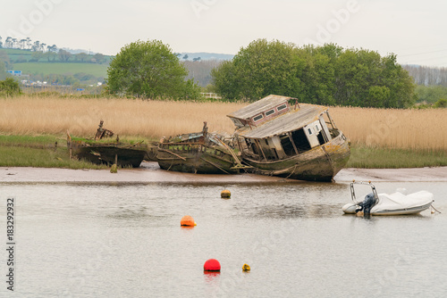 Shipwrecks at the shore of the Exminster Marshes, seen from Topsham, Devon, UK photo