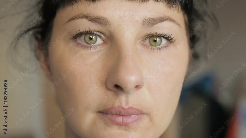 Face of young woman with tear drop close up. Crying Girl. Beautiful Woman Cry.