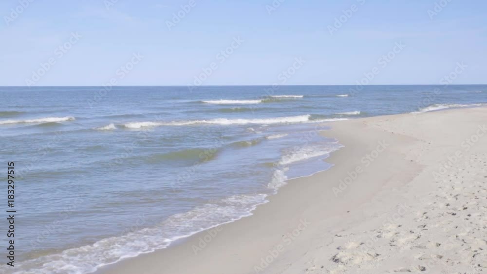 Beach with white sand. Outgoing coastal line. Slow Motion. Beach with white sand. Outgoing coastal line. Slow Motion.