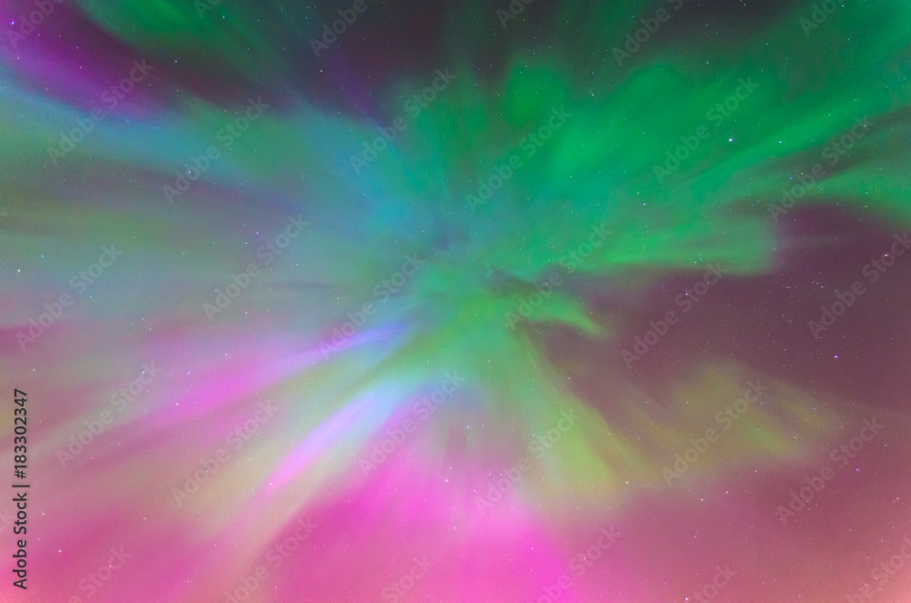 Polar lights Aurora Borealis in the night starry sky, texture and multi