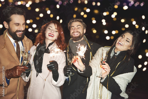Group of people with champagne flute enjoying together