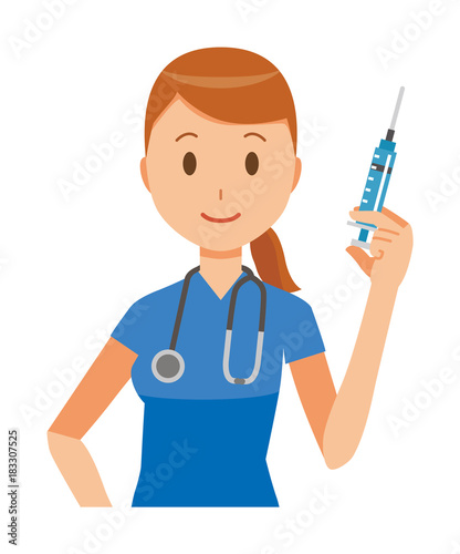 A female nurse wearing a blue scrub has a syringe