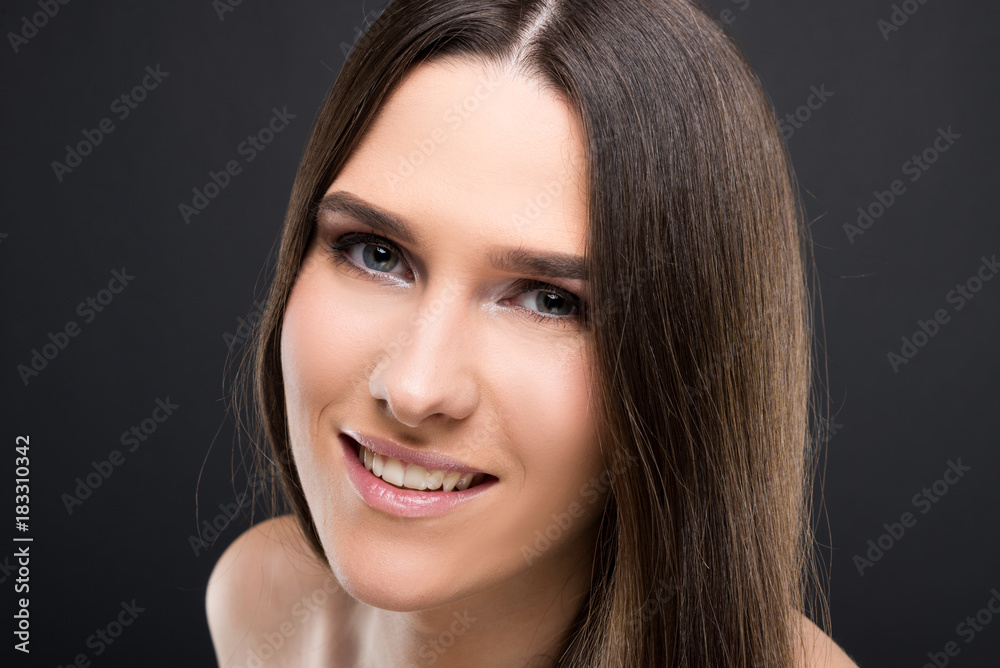 Young beautiful woman with perfect skin