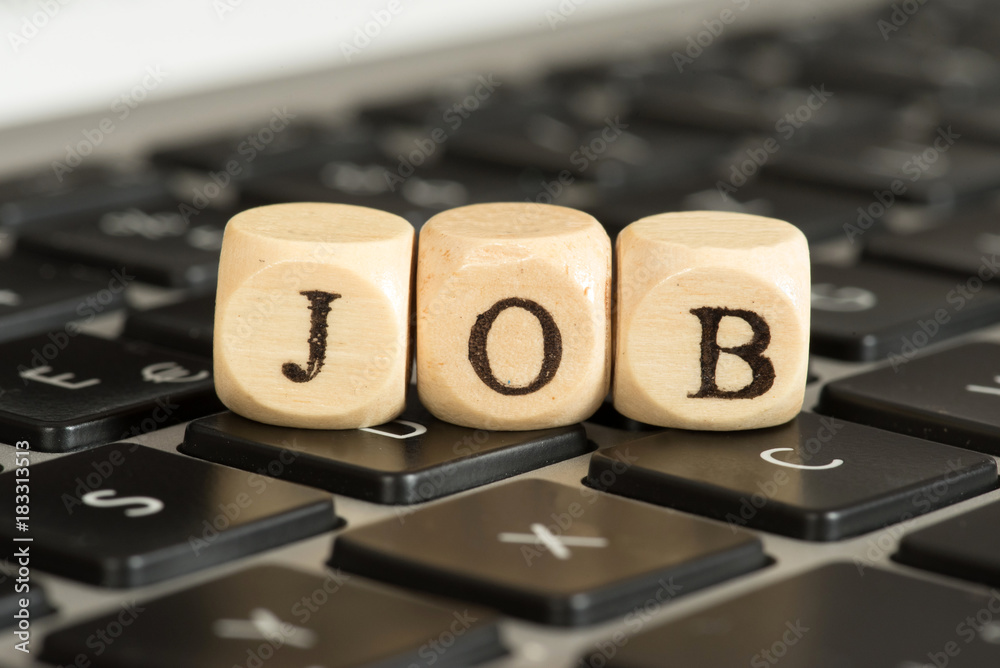 Ein Computer und Job StockFoto Adobe Stock