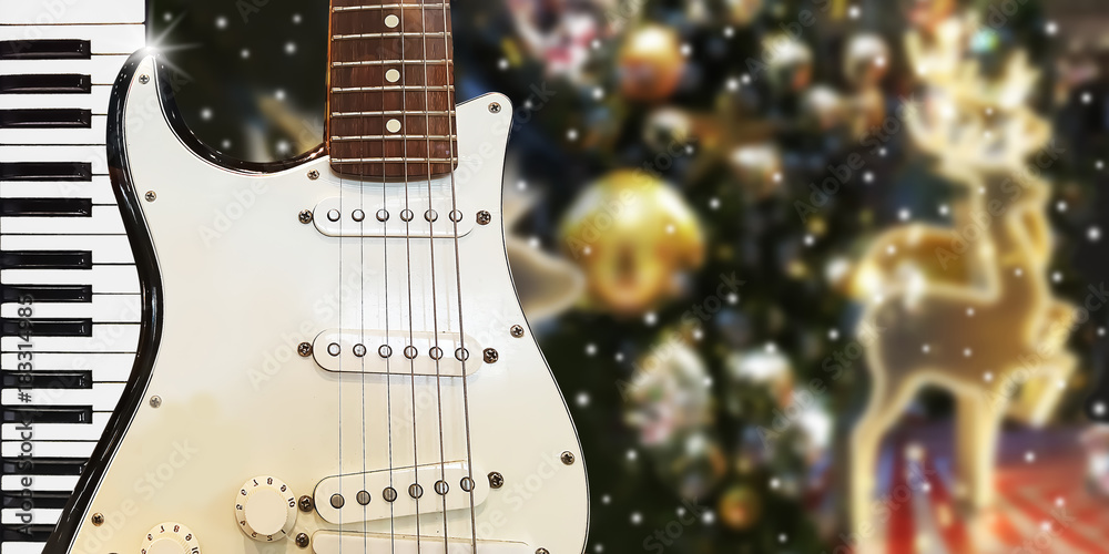 Christnas party music with piano and guitar at midnight time on christmas  night blur background. Stock Photo | Adobe Stock