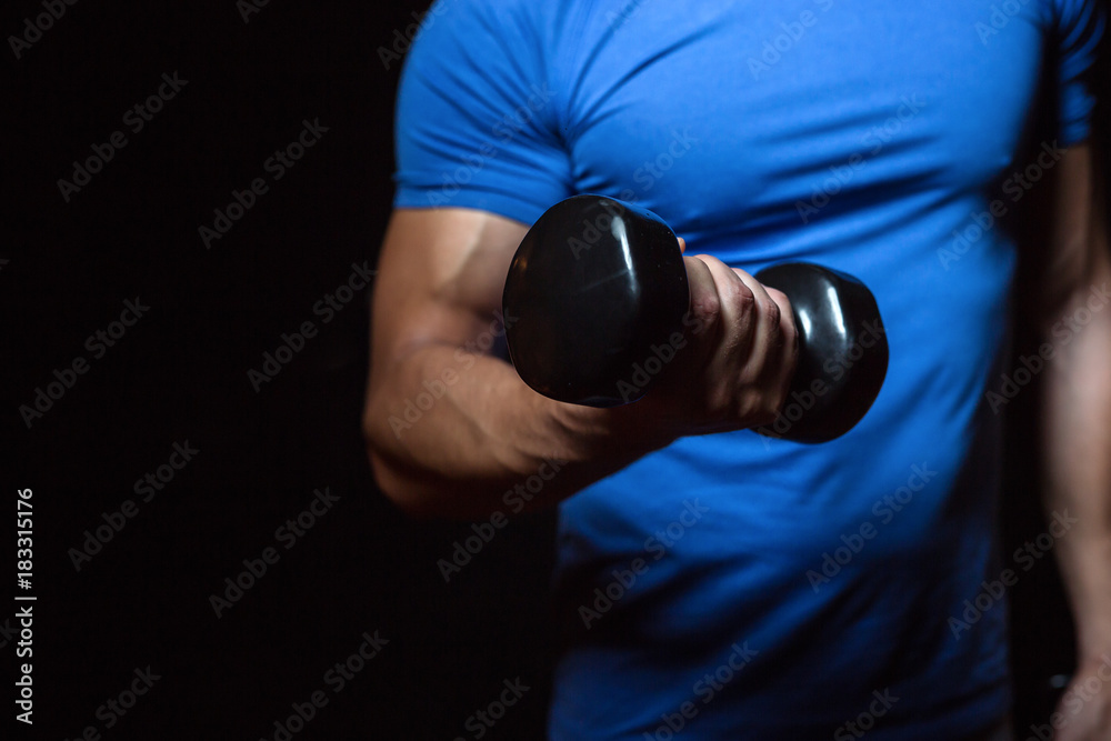 Bodybuilder with equipment portraits in studio Bodybuilder with equipment portraits in studio