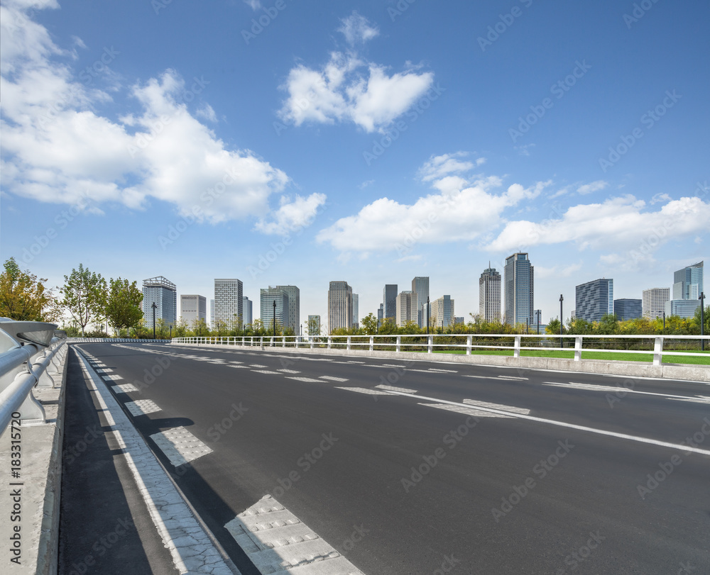 urban traffic road with cityscape in background, china