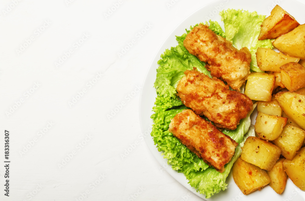 Fish and chips on white background, top view