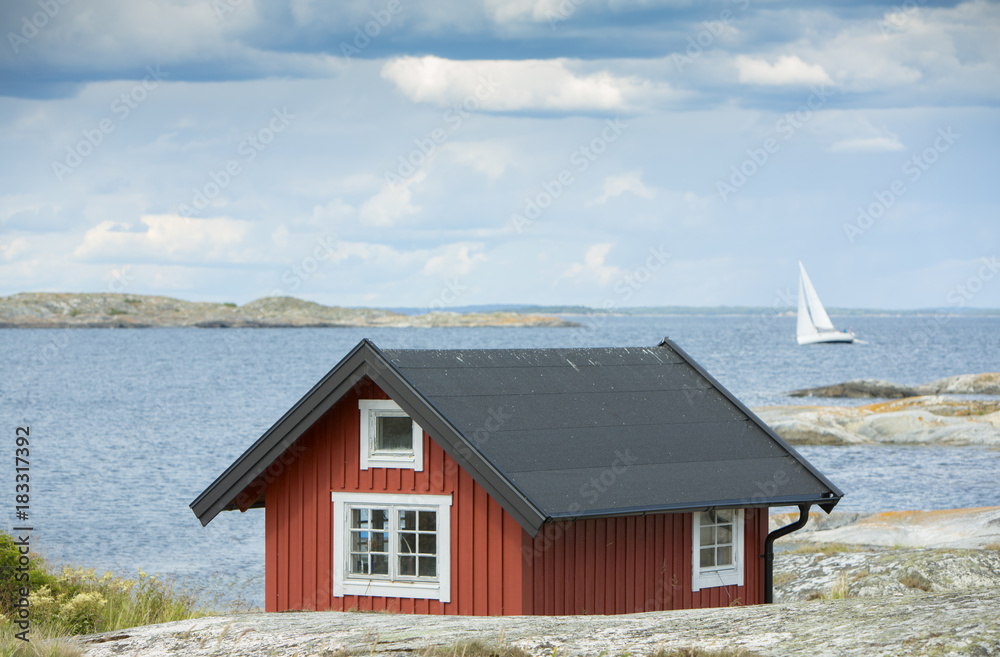 Exterior view of wooden house on seashore Exterior view of wooden house on seashore
