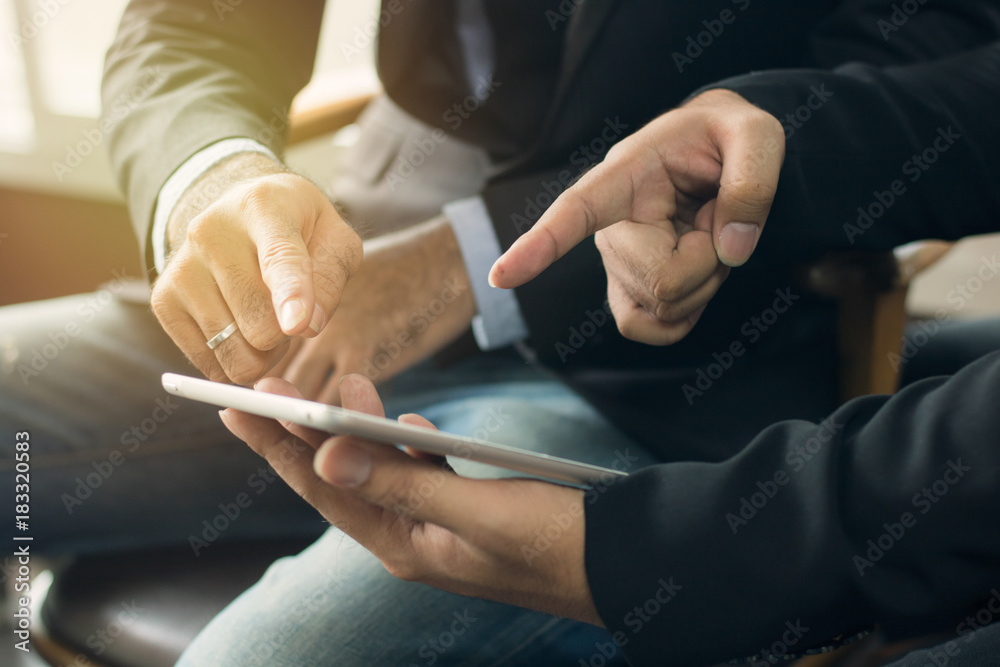 Businessman talking with colleagues about finance and success of company as presentation , concept as teamwork and team of business.