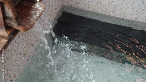 Japan natural mineral hot spring flows photo
