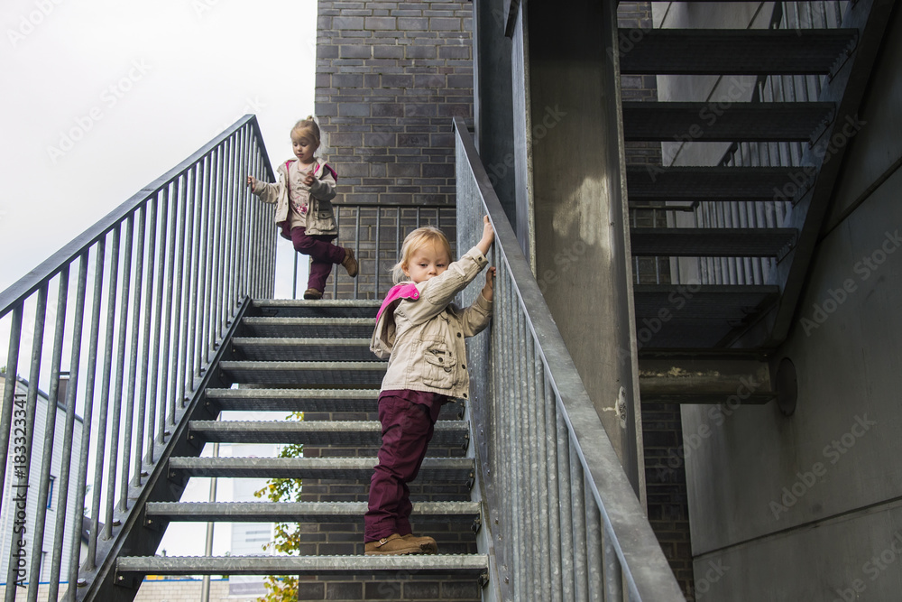 children on the staircase children on the staircase