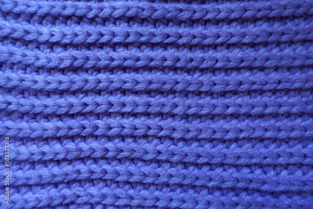 Handmade violet knitted fabric with horizontal ribbing pattern Handmade violet knitted fabric with horizontal ribbing pattern