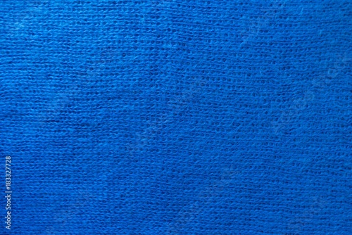 Handmade plain blue knitted fabric from above