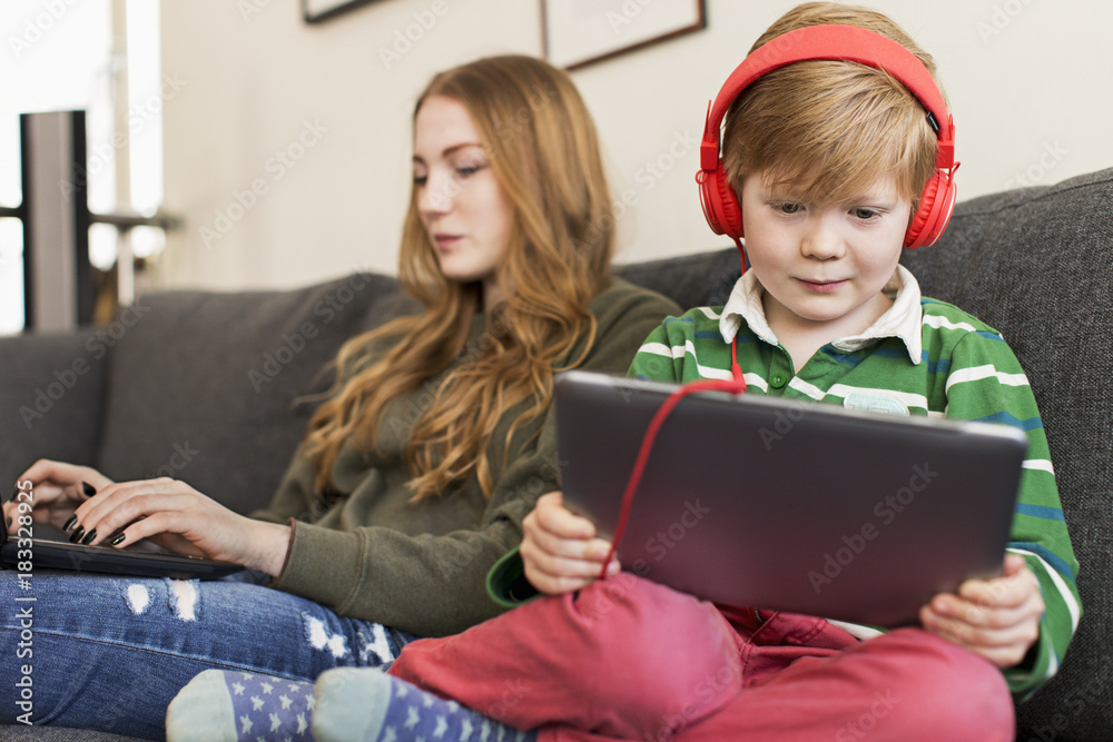 Boy using digital tablet Boy using digital tablet