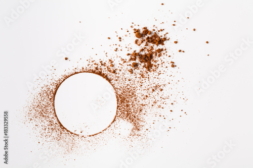Many cocoa powder on white table