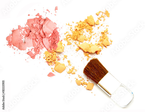Cosmetic pink and yellow powder make up and brush isolate.