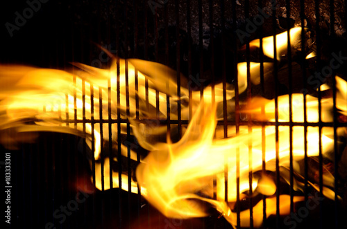 Black background with flames (red-hot grill)