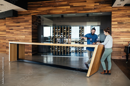 Couple drinking wine at winery