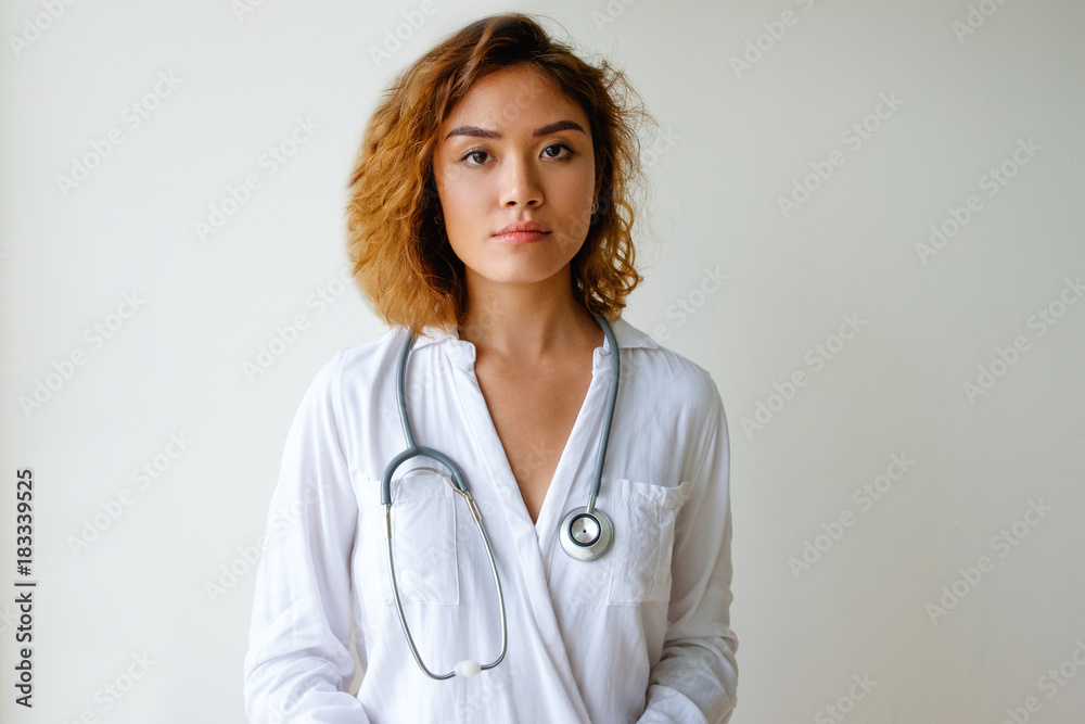 Portrait of confident young Asian female doctor Portrait of confident young Asian female doctor