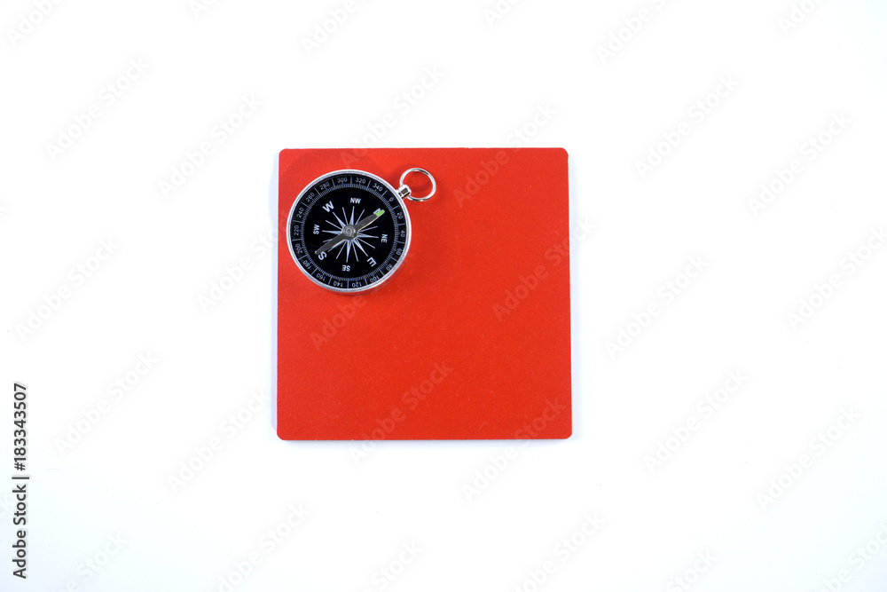 isolated compass and red board in white back ground