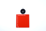 isolated compass and red board in white back ground