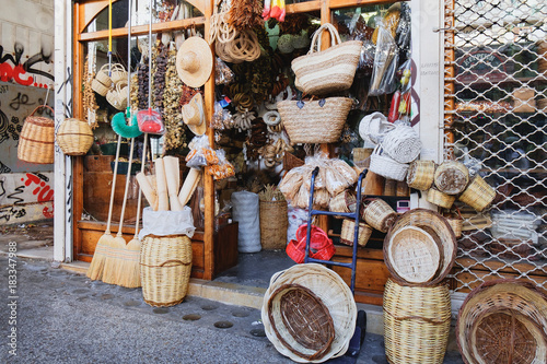 A small shop on Evripidou Street with handmade souvenirs for tourists - straw baskets, hats and other goods in memory of a trip to Greece