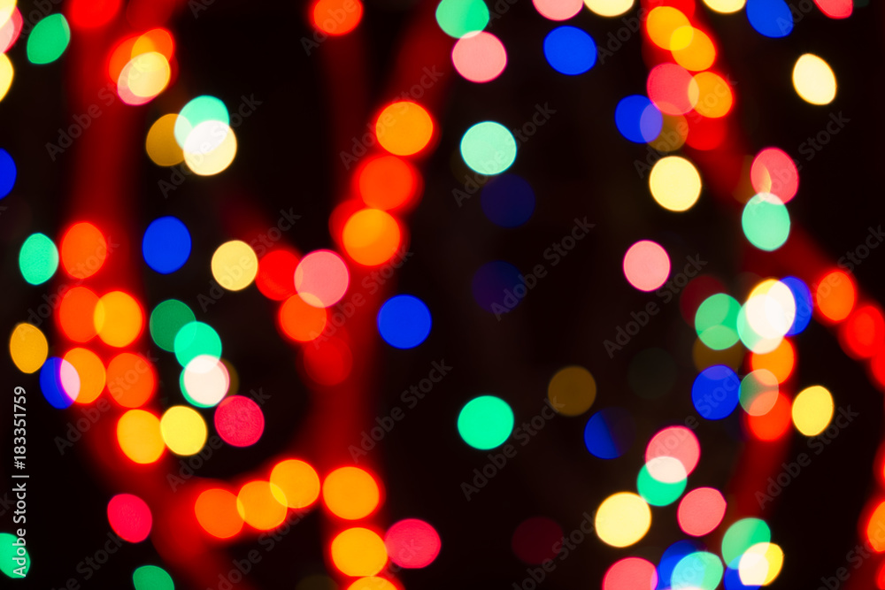 Blurry multicolored spherical lights on black, can use background Blurry multicolored spherical lights on black, can use background